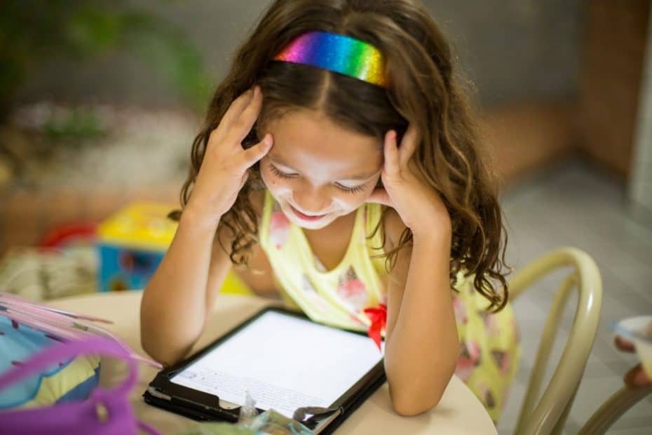 A girl looking at the iPad